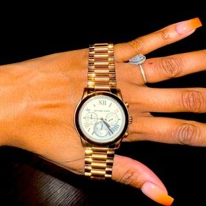 Michael Kors, gold watch black numbers on the inside of the face